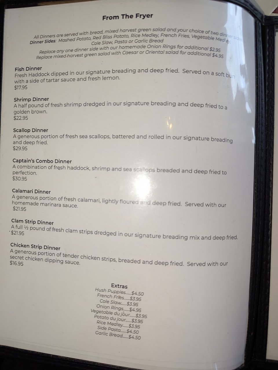 Restaurant menu listing coffee, tea, and soft drinks.